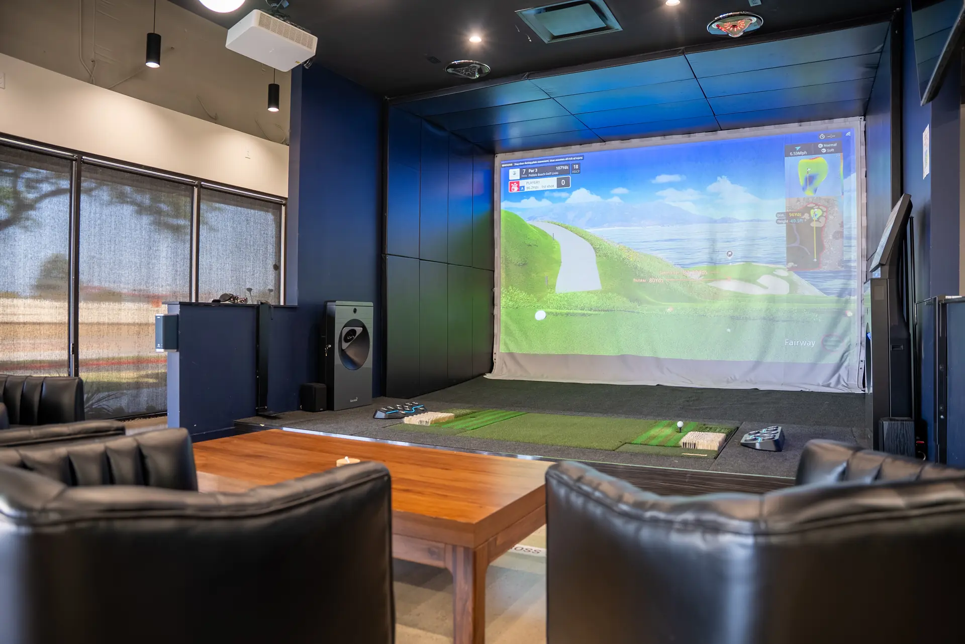 Golfzon NX simulator screen showing shot data during a 2-1-Fore league round